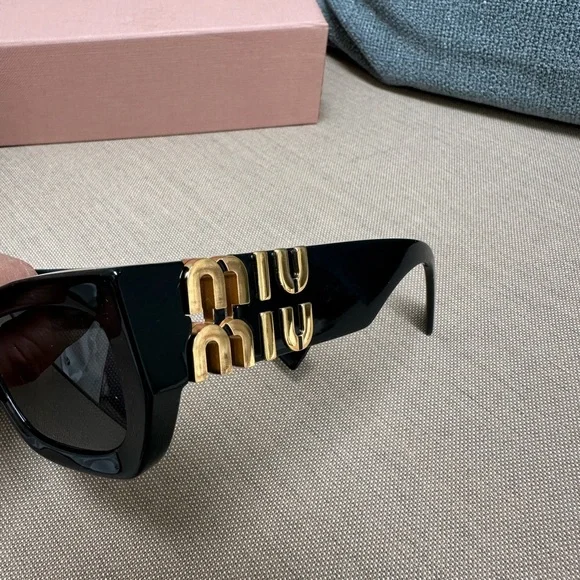 Miu Miu Black Sunglasses with Pink Case display picture 1